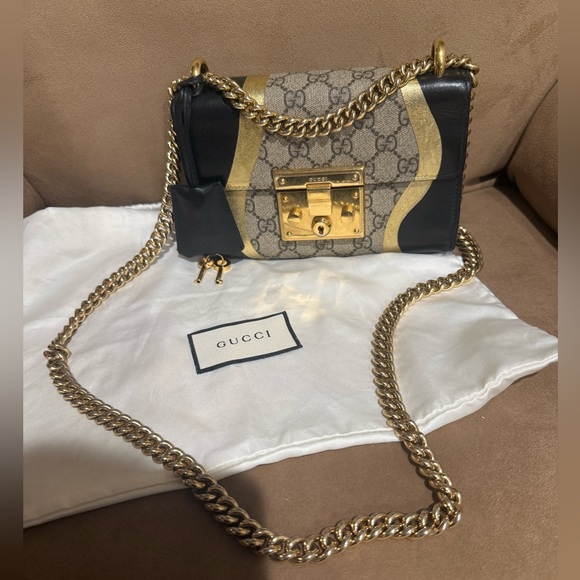 Gucci Handbags - 🔥24HR SALE🔥 
Limited edition GUCCI Supreme Monogram Calfskin Black/Gold Padlock